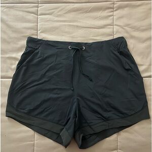 Training shorts, mid length for woman